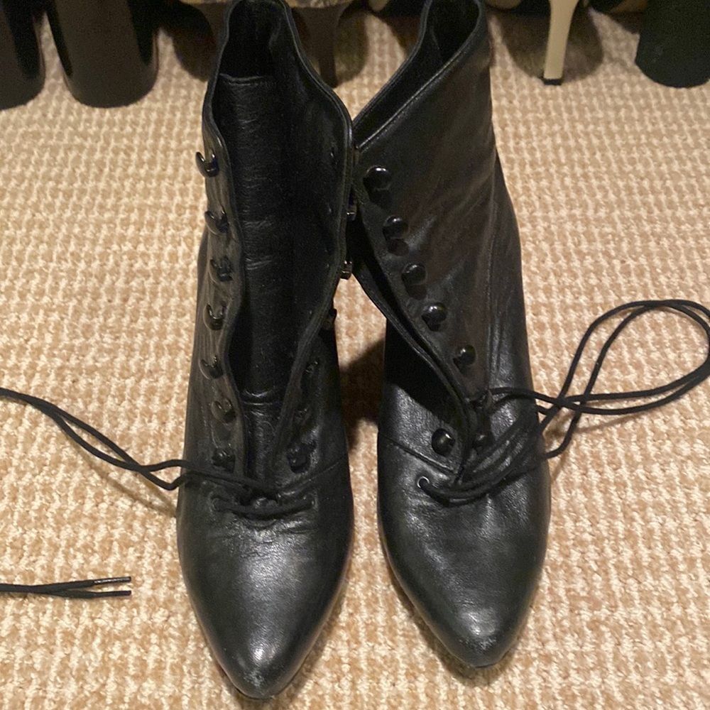 Lace up low heeled boots.